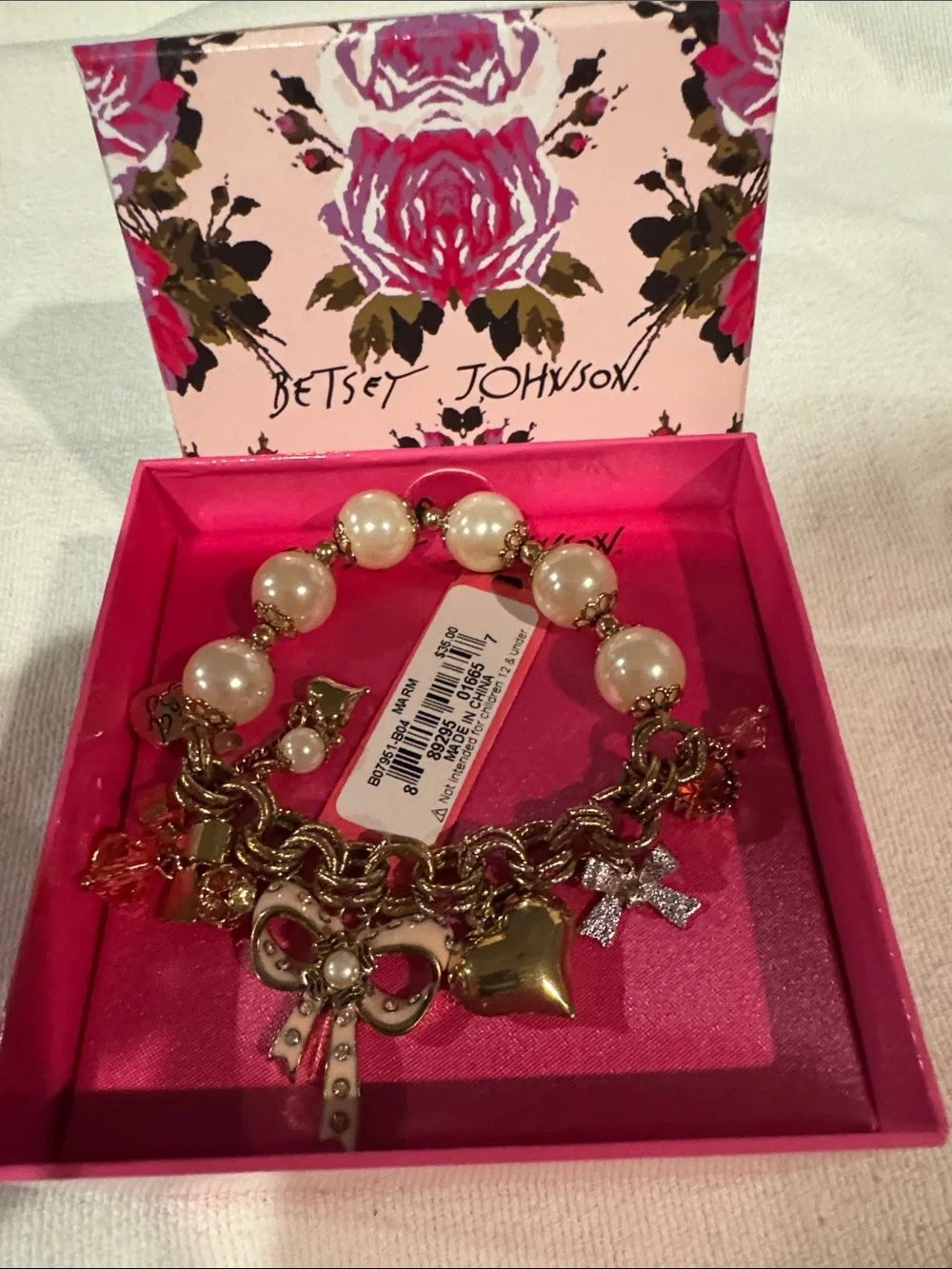 Betsey Johnson Gold-Tone Pearl Bracelet with Pink Crystal Charms / NWT - Picture 1 of 7